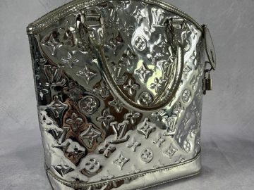 Sold at Auction: Louis Vuitton Metallic Silver Monogram Patent Leather  Miroir Speedy 35 Bag Con